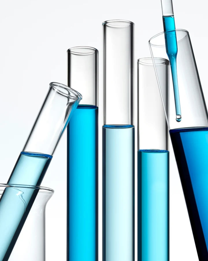 A group of test tubes with blue liquid