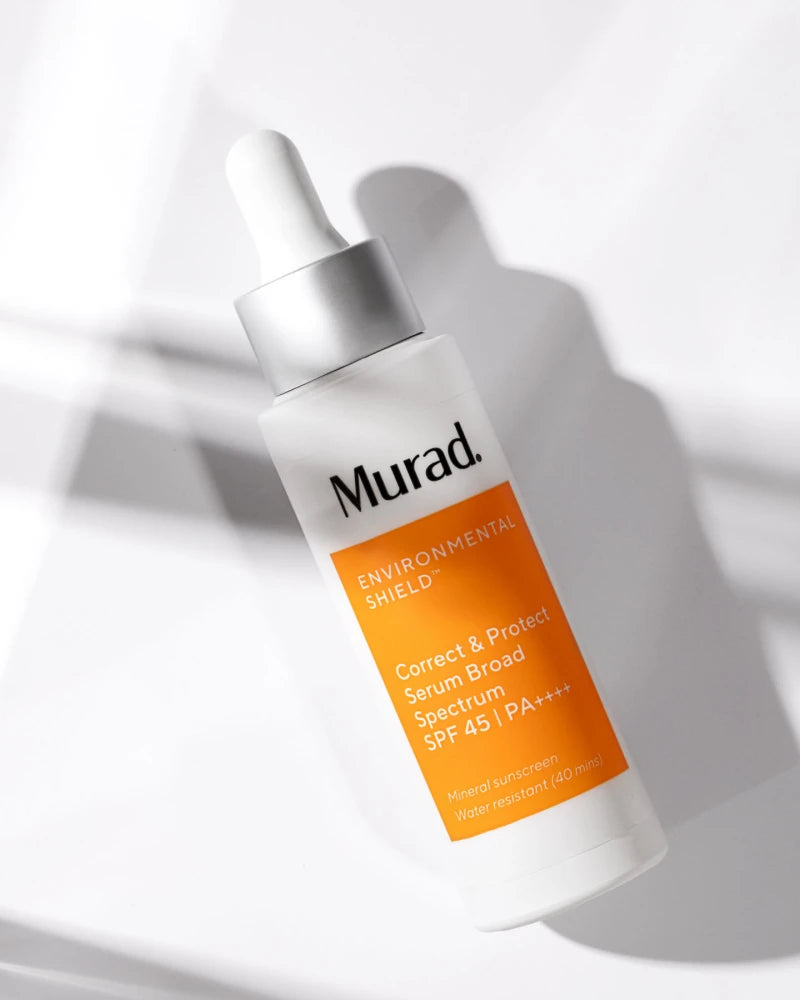 a bottle of correct & protect serum broad spectrum spf 45