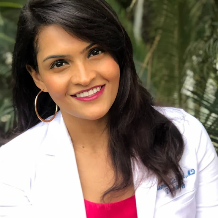 Dr. Suchismita smiling at the cmera