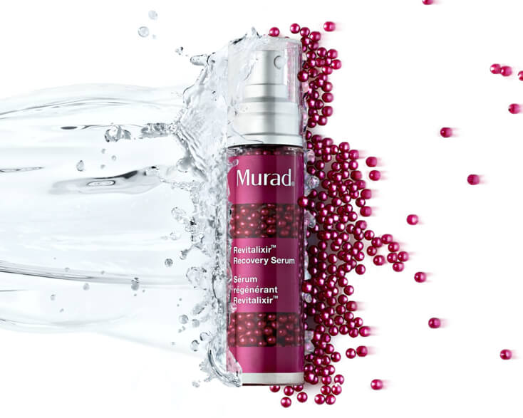 a bottle of revitalixar Recovery Serum splashing onto water