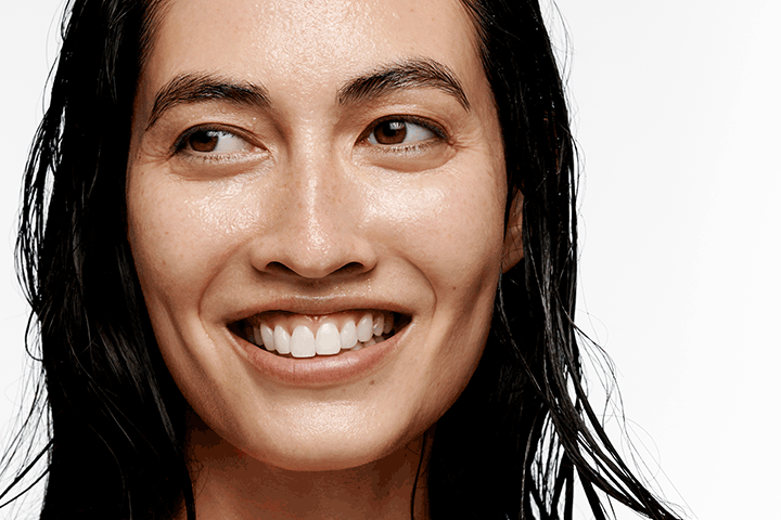 A reel of a person's face smiling