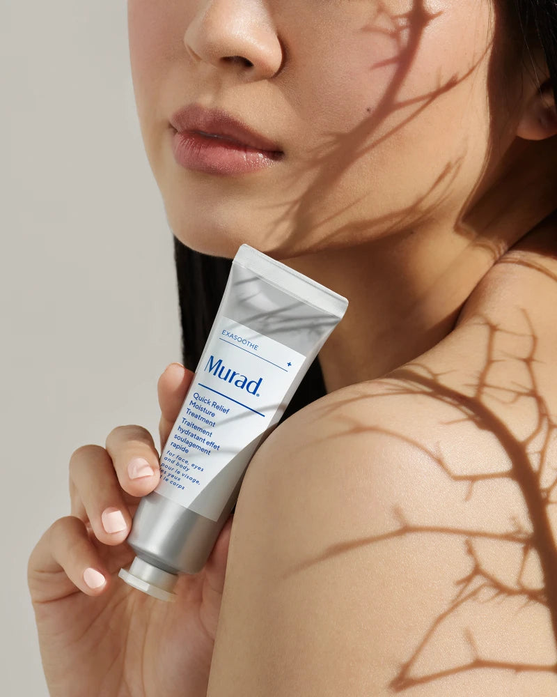 A person Holding a tube of Quick Relief Moisture Treatment