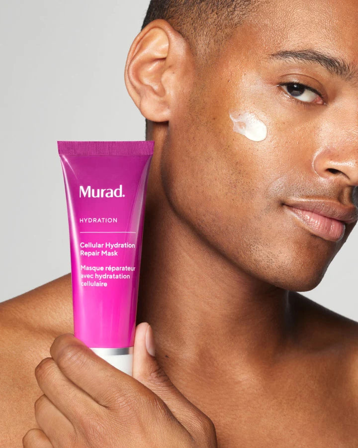 A person holidng a tube of Cellular Hydration Repair Mask