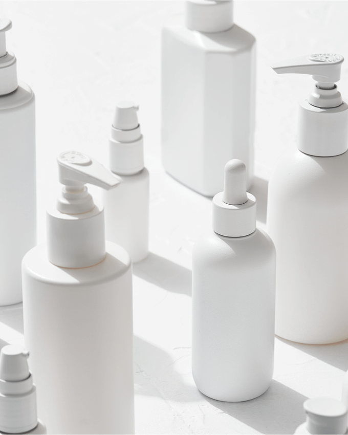 A group of white plastic bottles