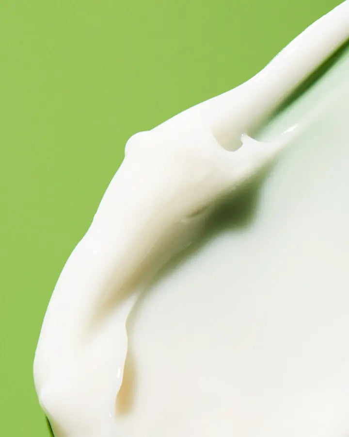 a close up of a white cream